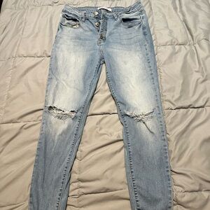Women's Light Blue Distressed Jeans
